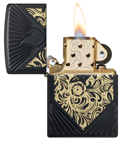 ˫ 2024 Collectible of the Year Windproof Lighter with its lid open and lit.